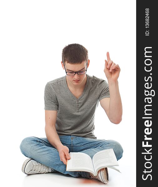 The young student with the book isolated on a white background