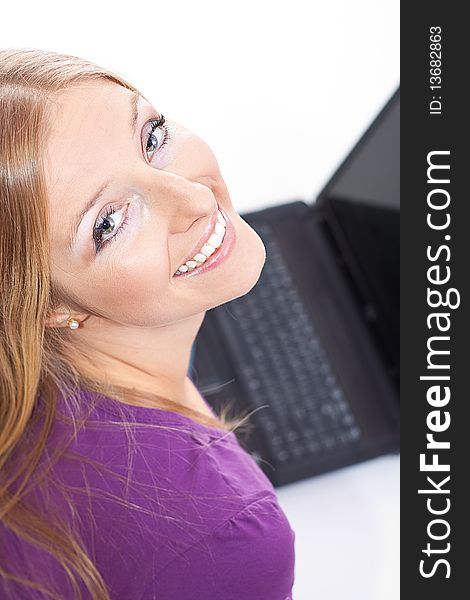Smiling Woman with open laptop aerial view. Smiling Woman with open laptop aerial view