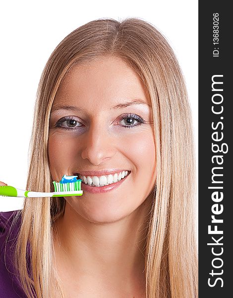 Caucasian blonde woman with toothbrush, toothpaste and healthy teeth