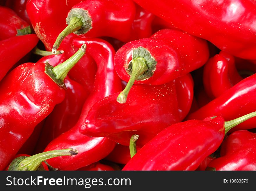 Some red hot peppers on the market. Some red hot peppers on the market