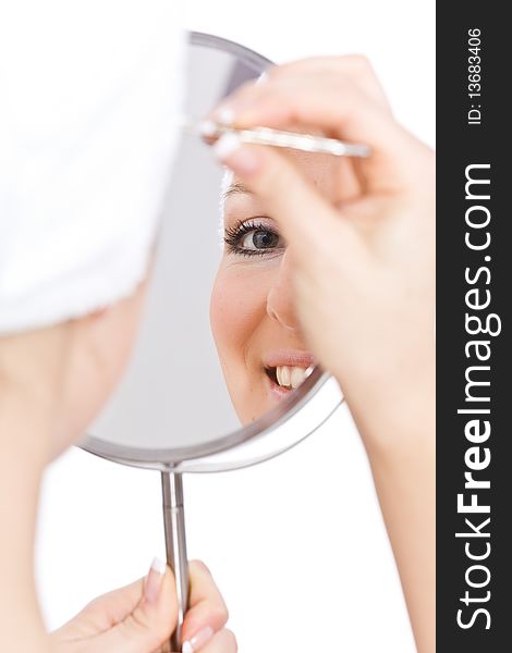 Woman makeup in mirror reflection on isolated background