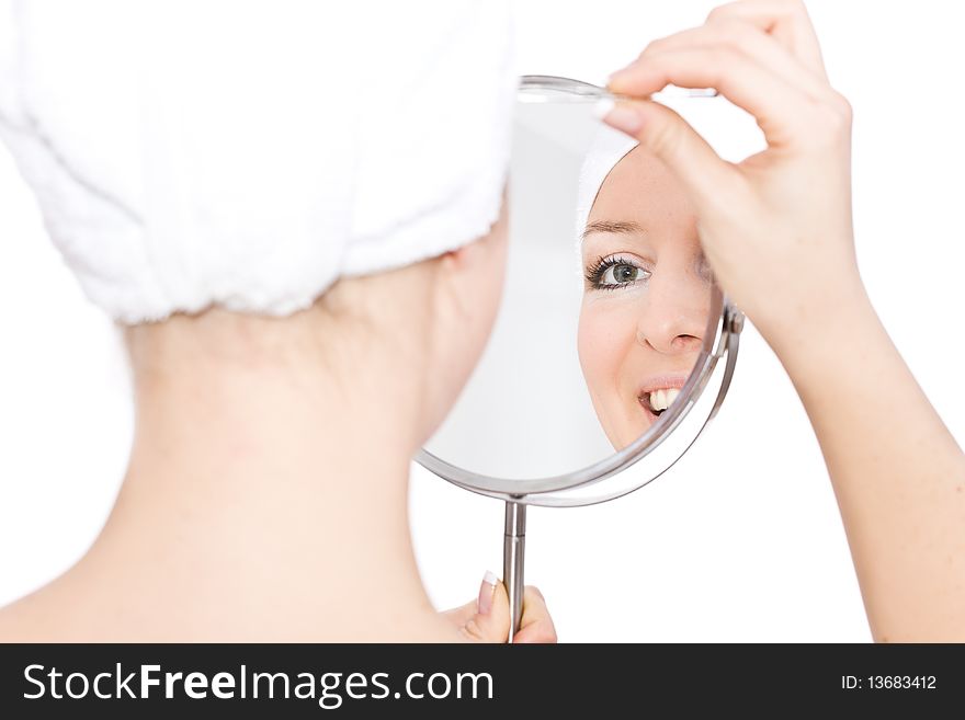 Woman makeup in mirror reflection on isolated background