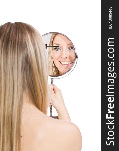 Woman makeup in mirror