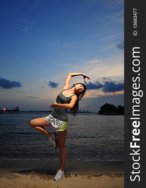 Asian Chinese Girl Practising Ballet during sunset. Useful for showing, musical, artistic type of pictures