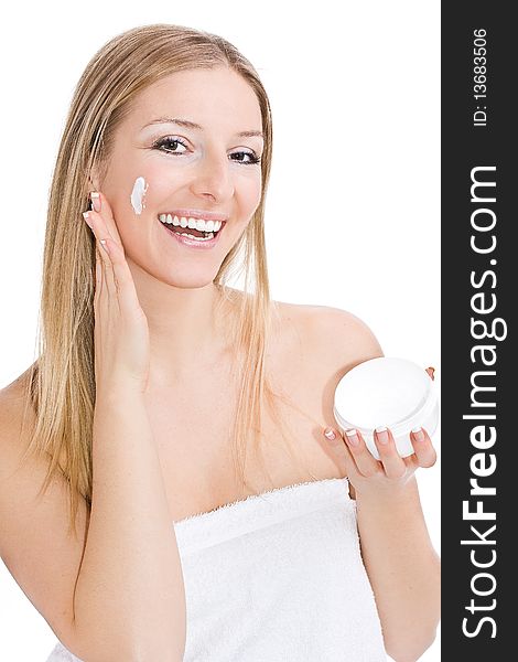 Woman Creaming Face