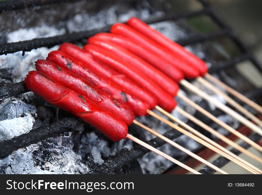Delicious hotdogs on barbaque grill