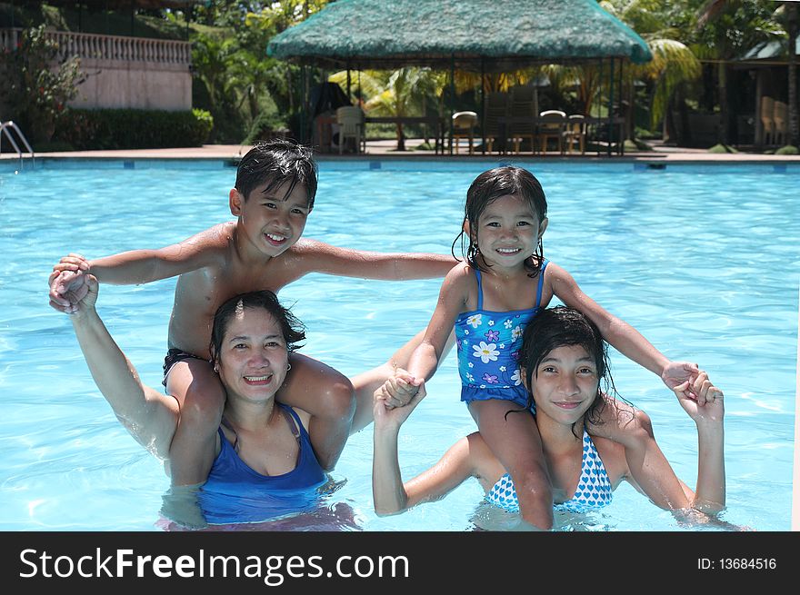 Happy friends on a pool