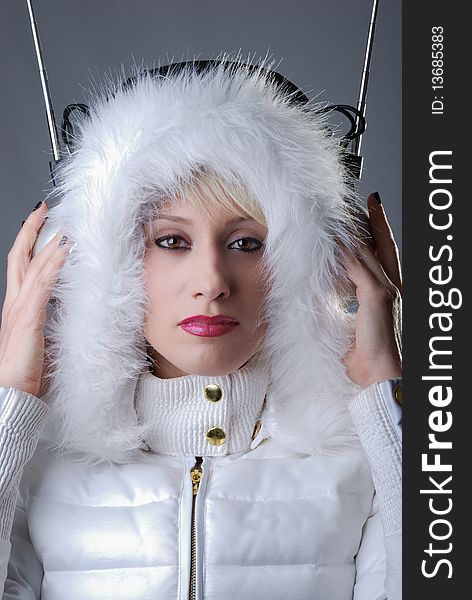 Woman With Vintage Headphones And Winter Jacket