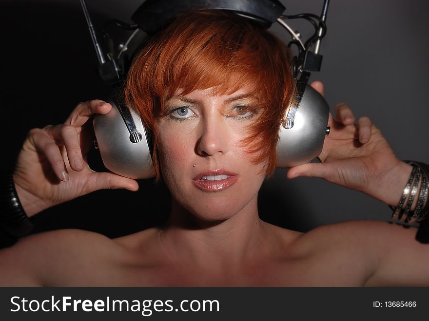Red Headed Woman With Vintage Headphones