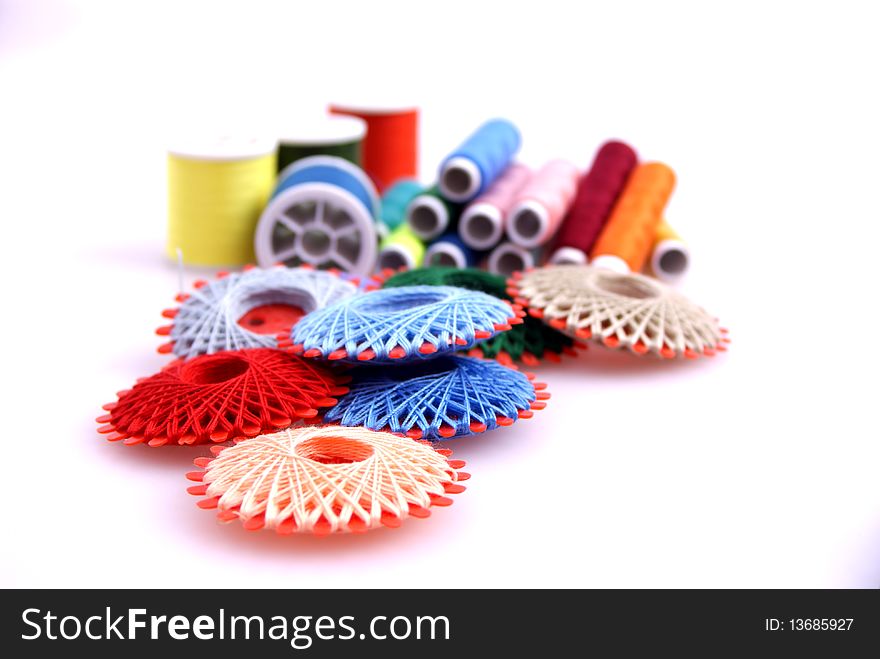 Colored spools of thread to sew