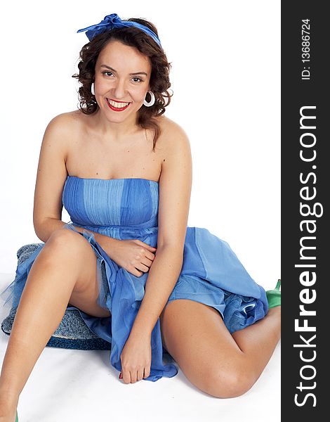 Pretty young pin-up girl posing on white. Pretty young pin-up girl posing on white