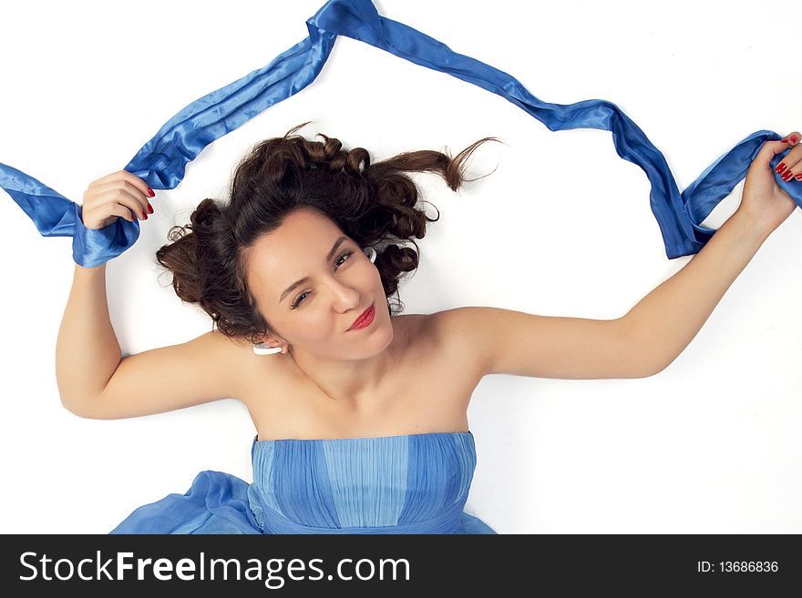 Pretty young pin-up girl posing on white. Pretty young pin-up girl posing on white