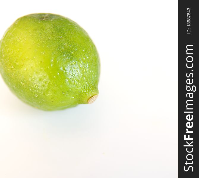 Fresh Limes on white background - close up