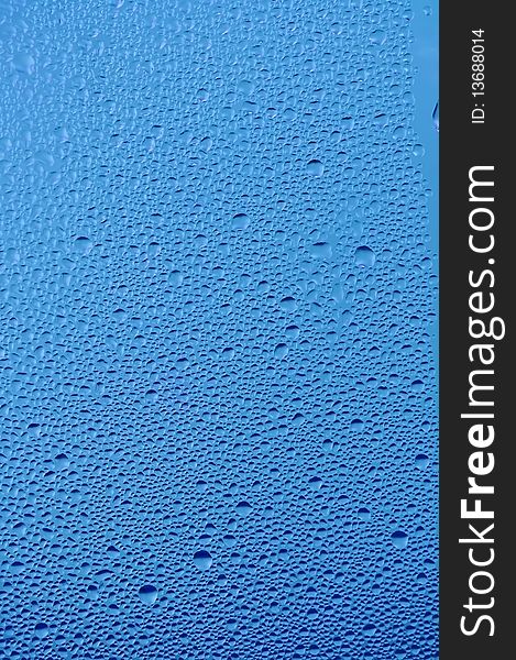Water bubbles on the window for background