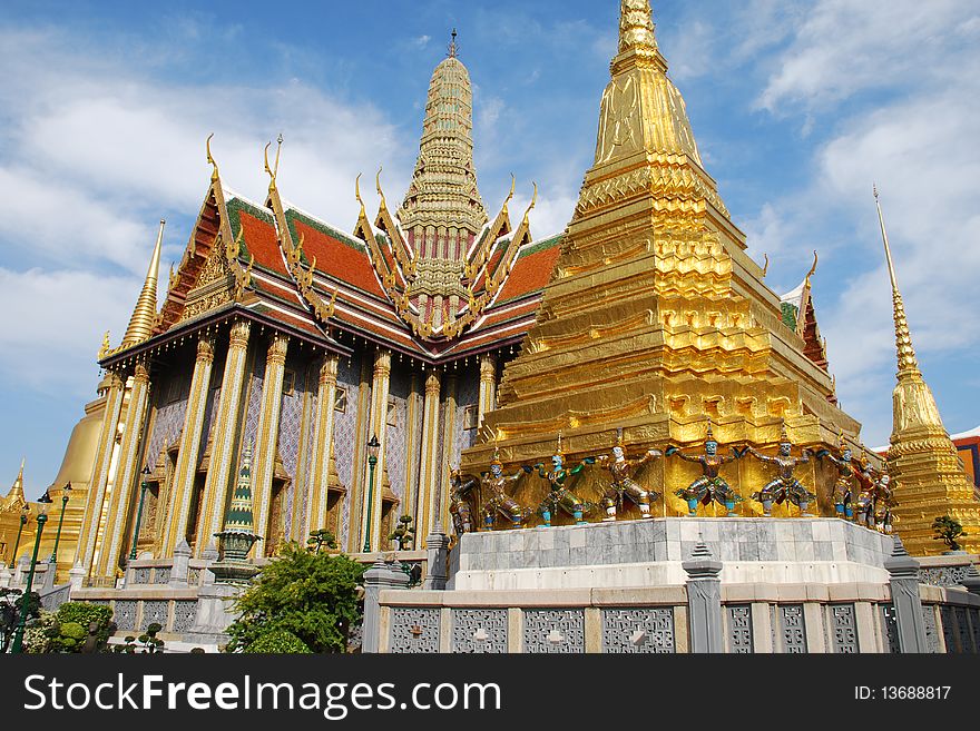 Gold pagoda front of Grand Palace Bangkok Thailand.