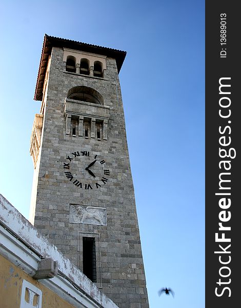 Church tower in main square in capital of Rhodes in Greece