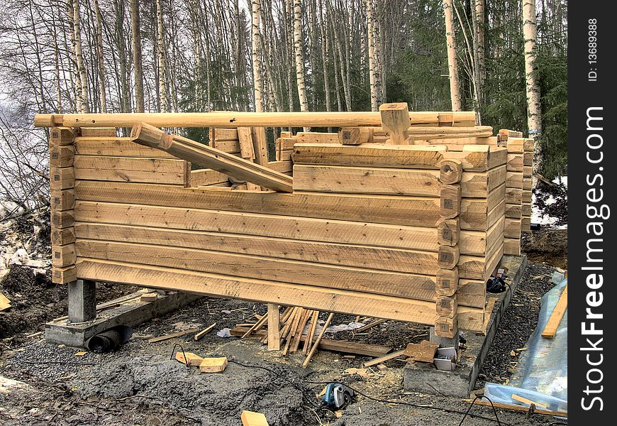 Log cabin under construction on site