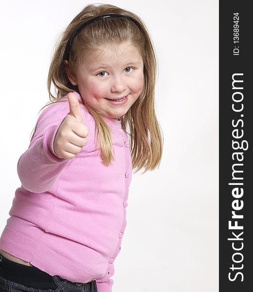 Little girl with her thumbs up