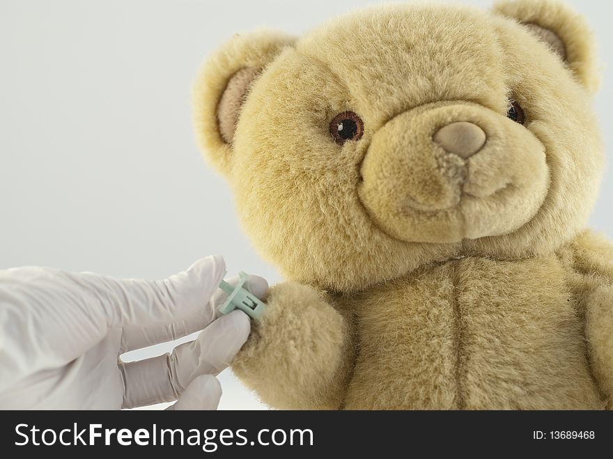 A capillary blood test on a teddy bear. A capillary blood test on a teddy bear.