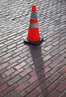 Traffic Cone On Brick Street Royalty Free Stock Photography Traffic Cone On Brick Street Royalty Free Stock Photography