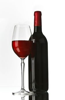 Red Wine Glass And Bottle Royalty Free Stock Photography