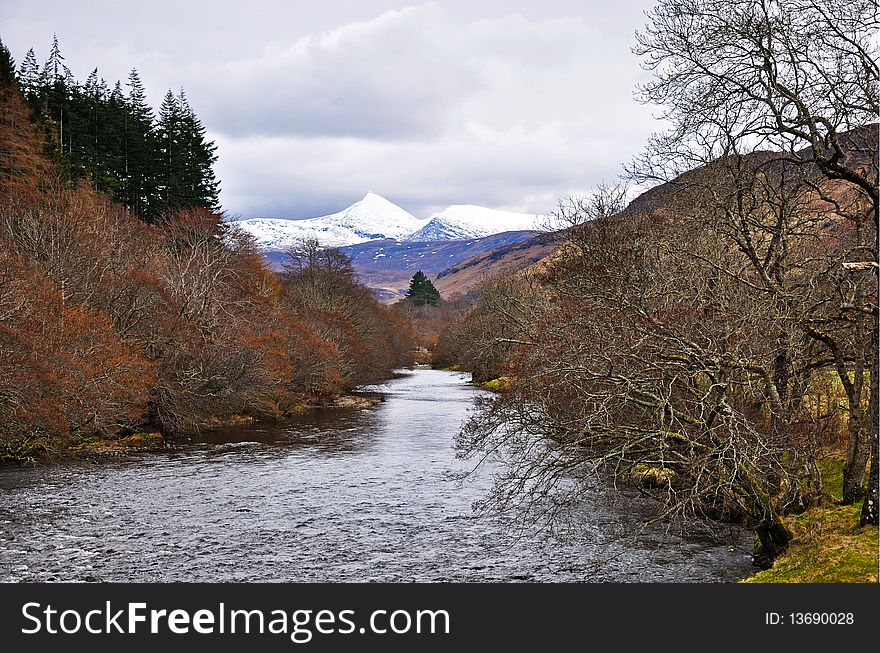 River framed by mountains, Scottish highlands. River framed by mountains, Scottish highlands