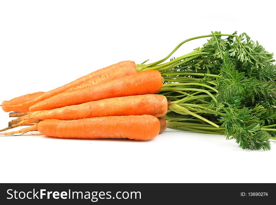 Bunch of fresh carrots with leaves on white background