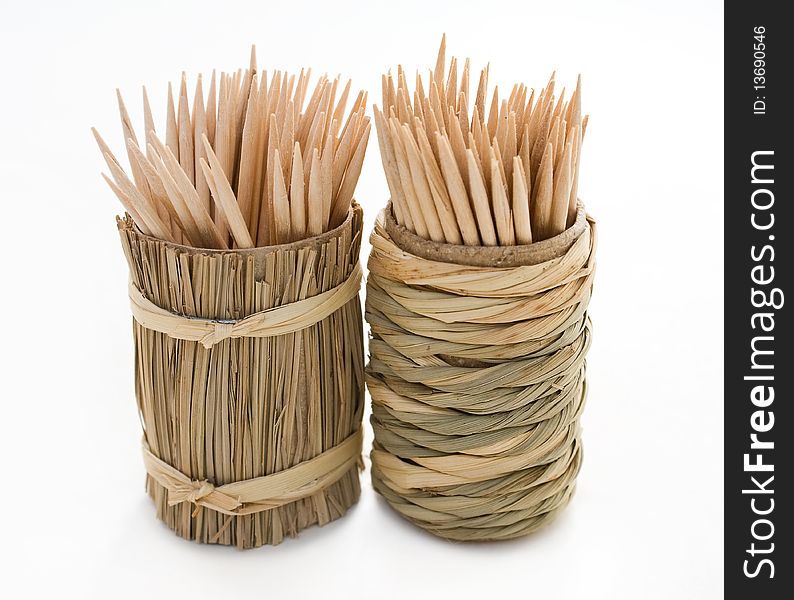 Round bamboo box of toothpicks isolated on white background