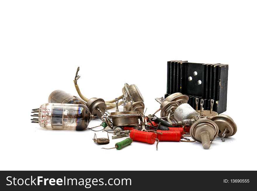 Old radio components on white background