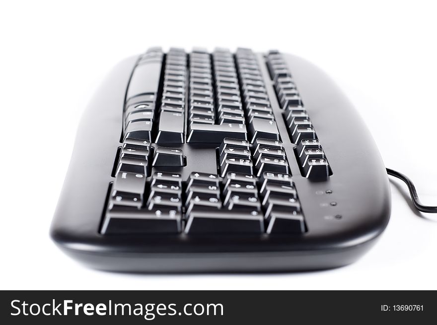 The keyboard isolated on a white background close up. The keyboard isolated on a white background close up.