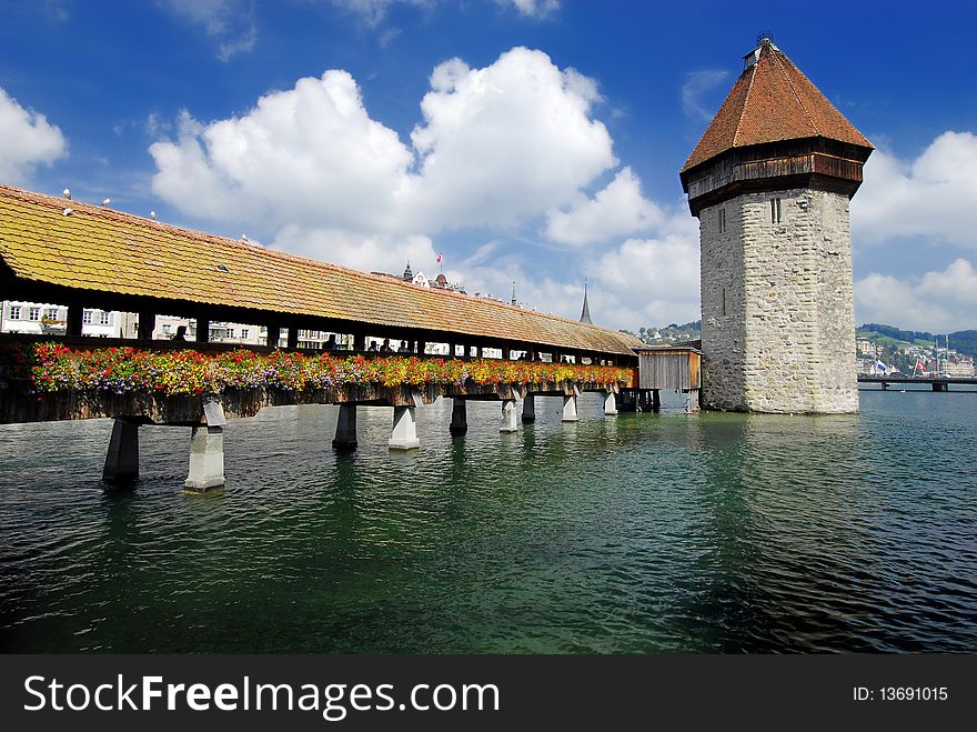 The historical water tank and the bridge of Luzern. The historical water tank and the bridge of Luzern
