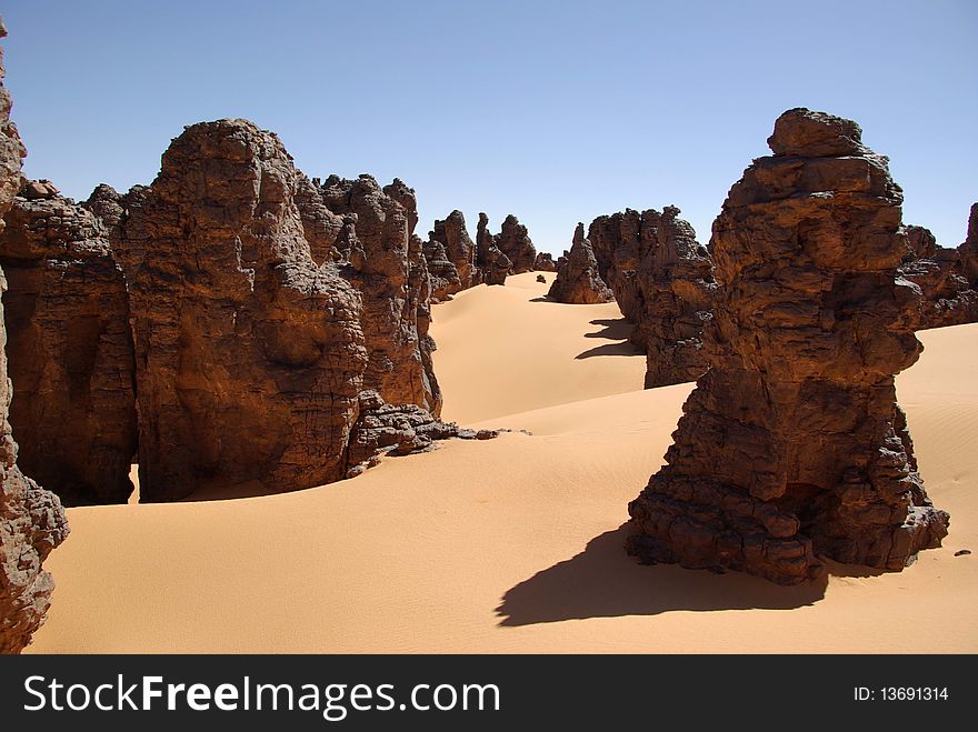 Sandstone peaks in the desert of Libya, in Africa. Sandstone peaks in the desert of Libya, in Africa