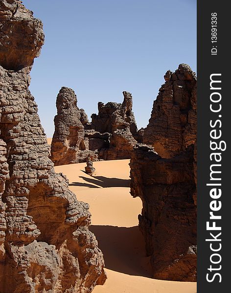 Sandstone peaks in the desert of Libya, in Africa. Sandstone peaks in the desert of Libya, in Africa