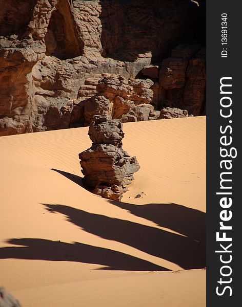 Sandstone peak in the desert of Libya, in Africa. Sandstone peak in the desert of Libya, in Africa