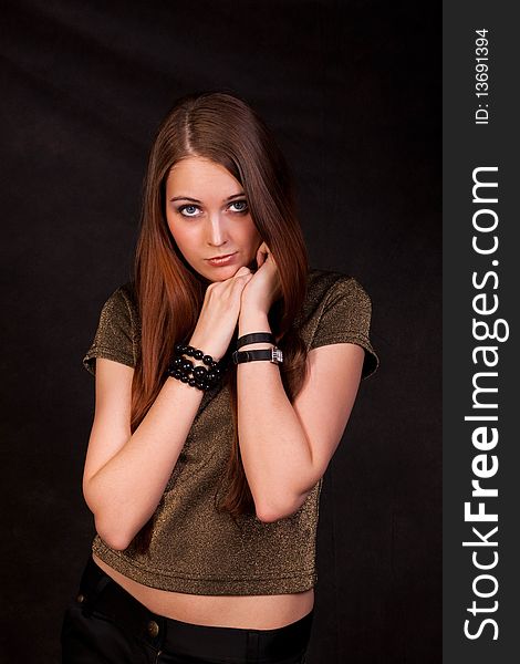 Studio photo. The girl in a vest. Studio photo. The girl in a vest.