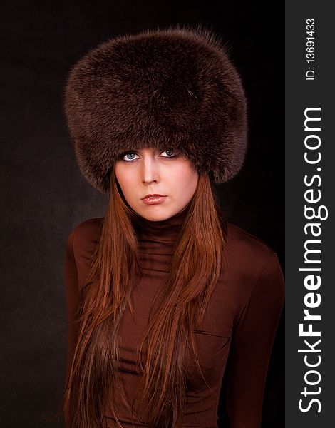 The girl in a fur cap. The girl in a fur cap