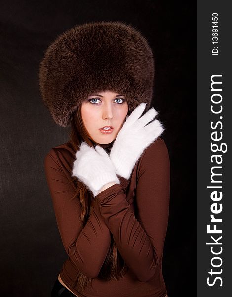 The girl in a fur cap. The girl in a fur cap