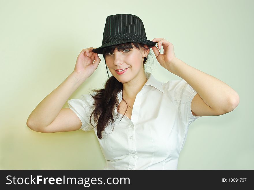 Young woman wearing black hat. Young woman wearing black hat