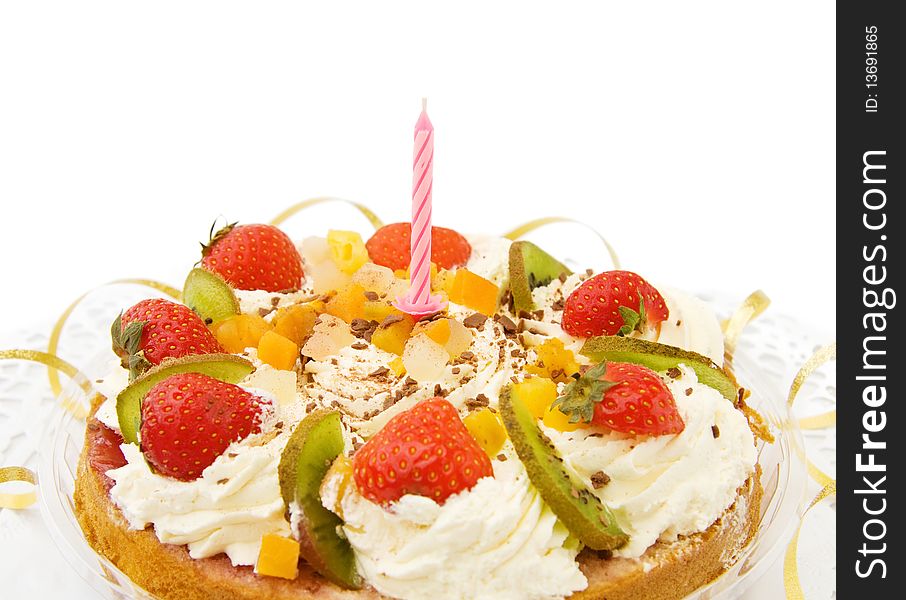 Celebrating a special day with fresh strawberry cake with candle and golden ribbons. Isolated over white. Celebrating a special day with fresh strawberry cake with candle and golden ribbons. Isolated over white.