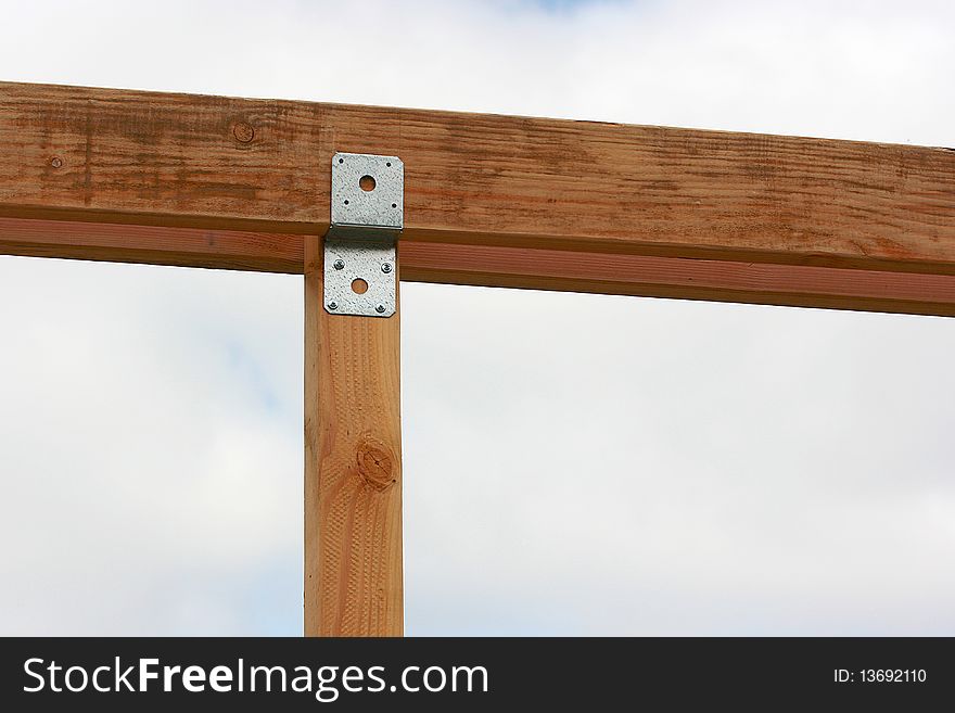 Building design from a beam and two bars.