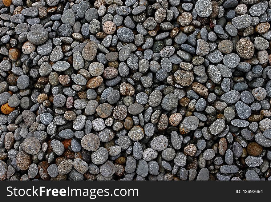 River stones for the wall material or home material.