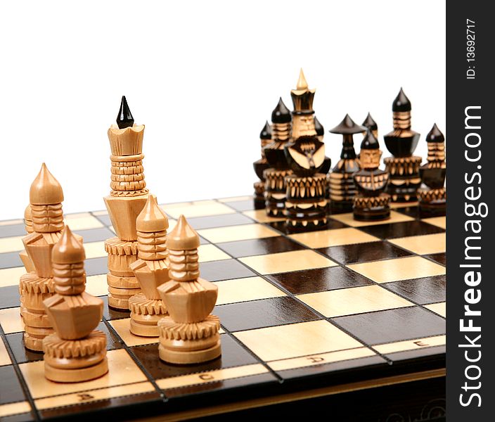Wooden chess on a white background