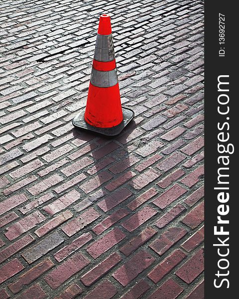 Traffic Cone On Brick Street