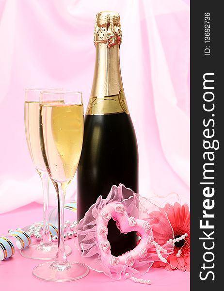 Bottle with a champagne and pink heart. Bottle with a champagne and pink heart