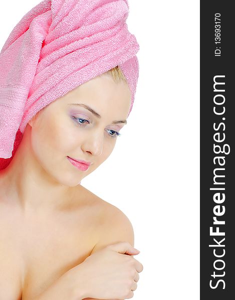 Young beauty woman  in a pink bath towel with a bit soft effect. Young beauty woman  in a pink bath towel with a bit soft effect