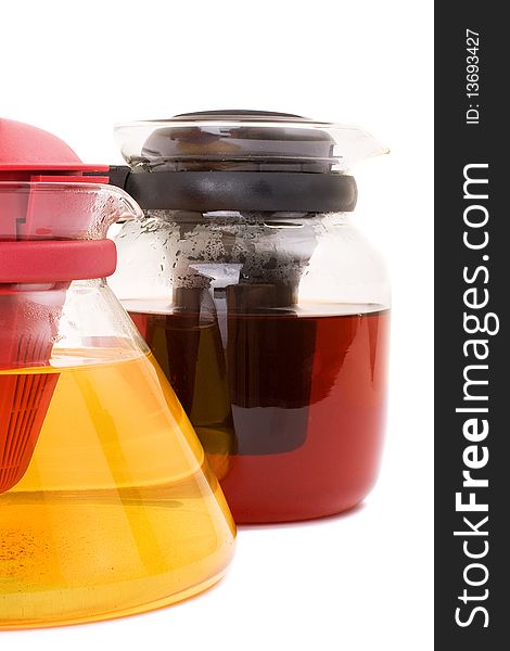 Series. A glass teapot isolated on a white background. Green and black tea