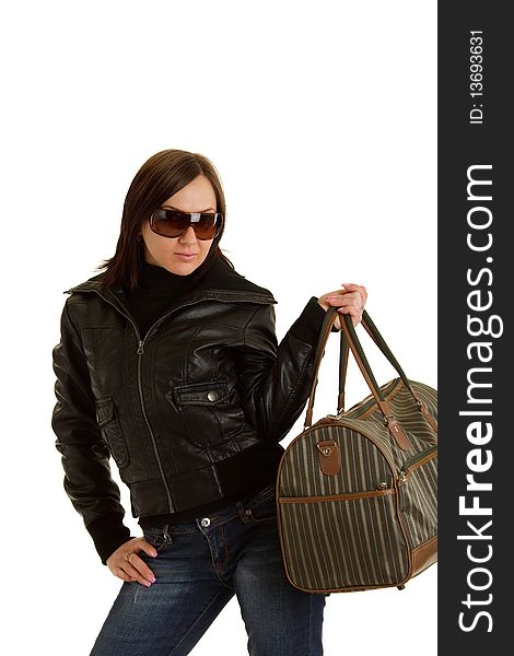 Girl with leather jacket and sunglasses holding a bag. Girl with leather jacket and sunglasses holding a bag