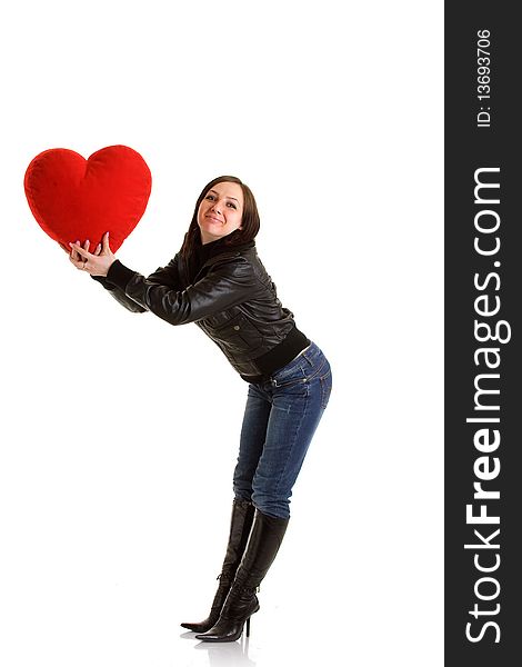 Photo of girl giving a heart for valentines day to somebody. Photo of girl giving a heart for valentines day to somebody
