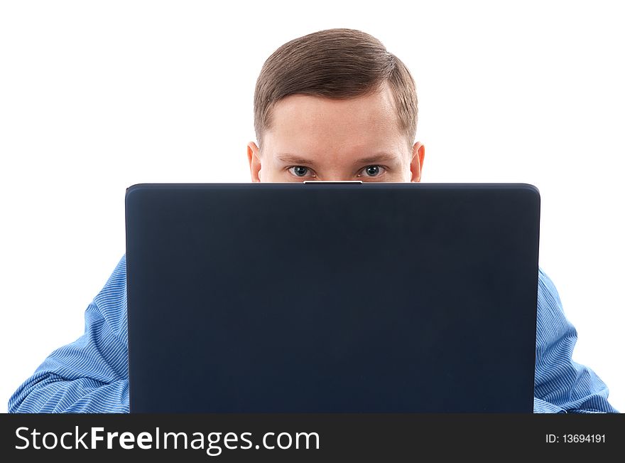 A young man using his laptop isolated on a white background