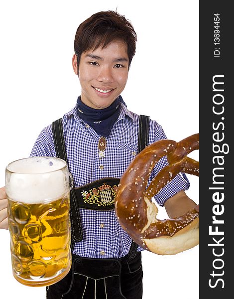 Man holds Oktoberfest beer stein and Pretzel